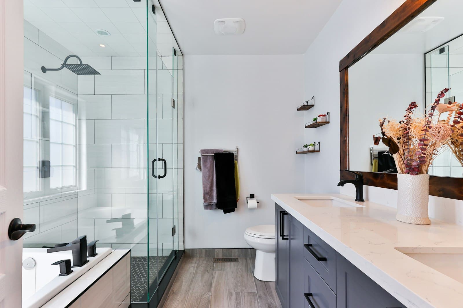 Spotless bathroom with a glass shower and clean vanity
